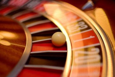Live casino table with dealer and players